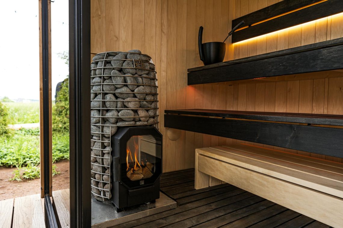 elegant nordic sauna with modern electric heater